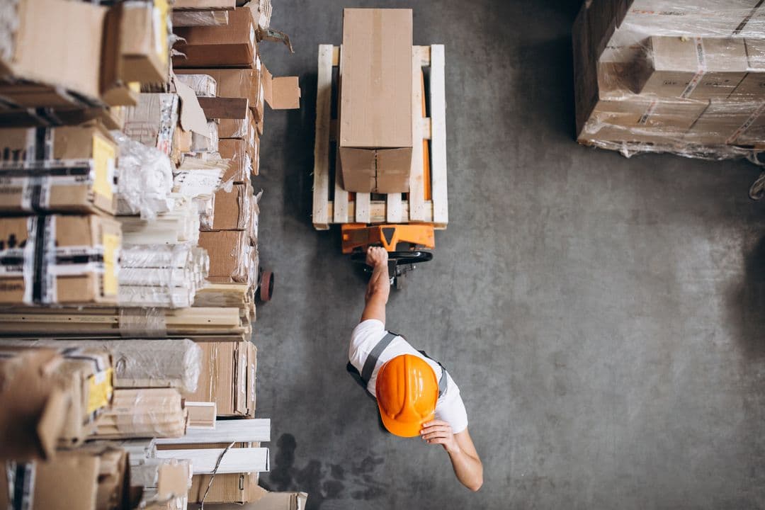 Warehouse worker handling a package