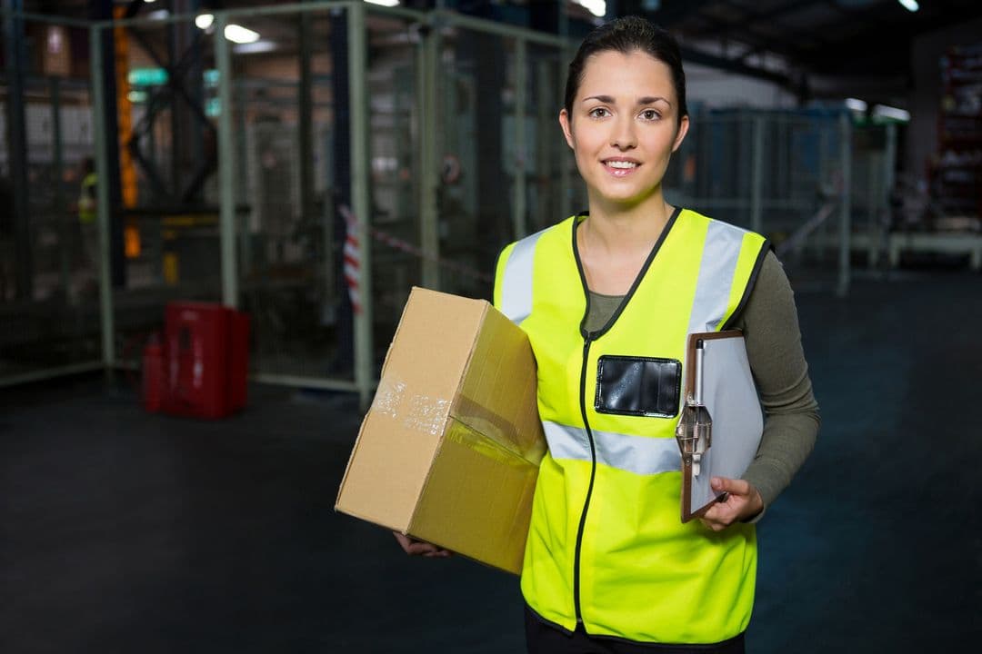 Team member carrying a package